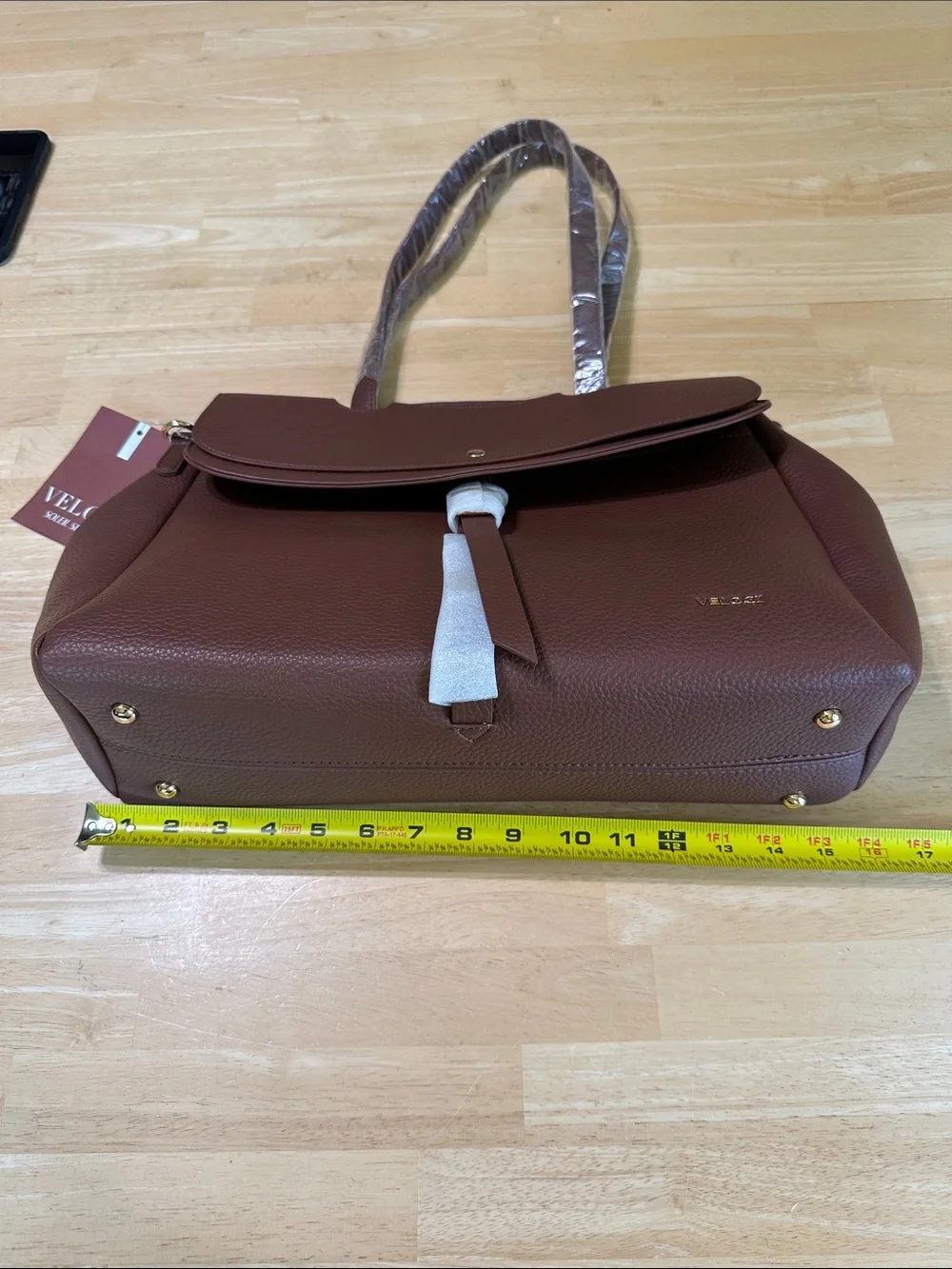 VELOCIO Brown Pebbled Tote with Flap and Tassel